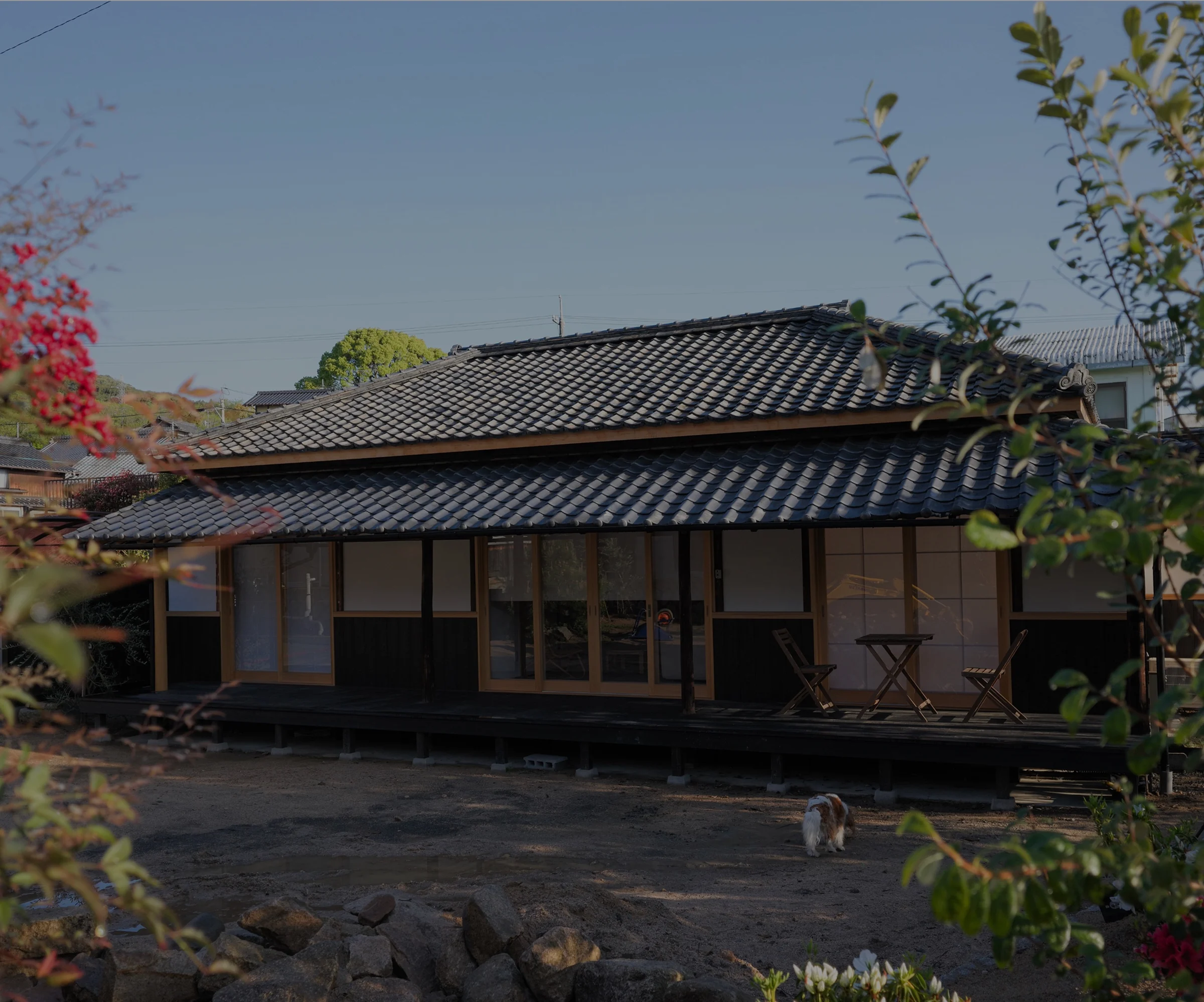 The Tea House exterior in afternoon light, veranda open to the garden