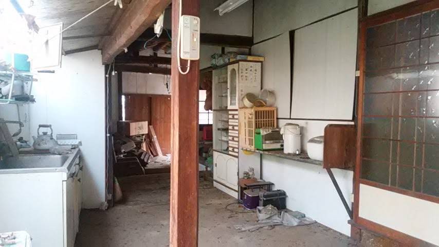 The old kitchen before restoration, sink and crockery cabinet left in place